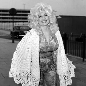 Dolly Parton seen here at London Airport 16th April 1976 Local Caption Watscan
