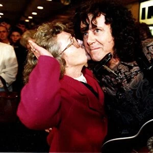 Donovan being kissed by old woman at Maryhill shopping centre