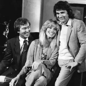 Dudley Moore and Susan Anton laughing during filming interview with Des O