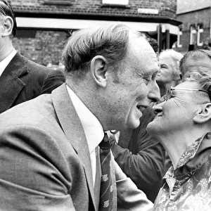 Durham Miners Gala - Neil Kinnock is given a kiss from an admirer as he mingles with
