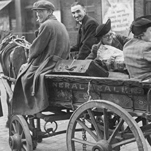 An East End family leaving the city with their belongings on the back of a horse