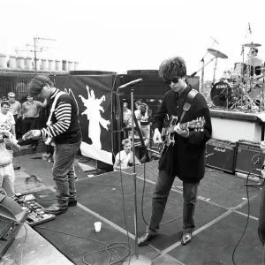 Echo and the Bunnymen rock group playing on London rooftops. 6th July 1987