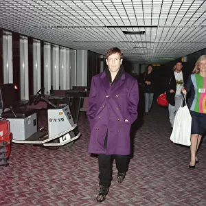 Elton John arriving at Heathrow Airport from New York on Concorde. 26th October 1993