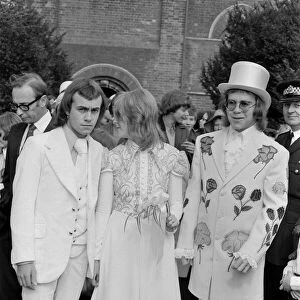 Elton John (right) pictured here as best man to his songwriting partner Bernie Taupin