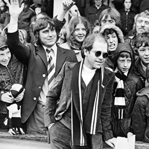 Elton John, singer and songwriter pictured with Watford Football supporters in Darlington