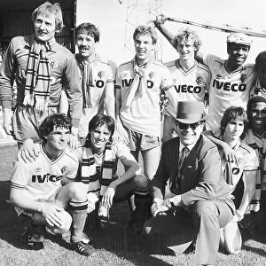 Elton John superstar and Watford FC pose after their match against Liverpool