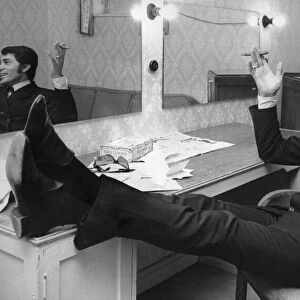Engelbert Humperdinck puts his feet up in his dressing room before the first show at