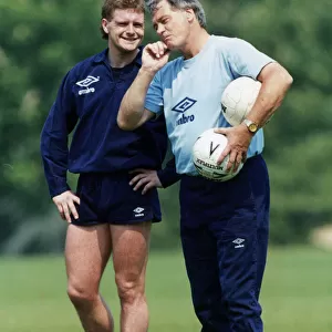 England footballer Paul Gascoigne listens to advice given by national team manager Bobby