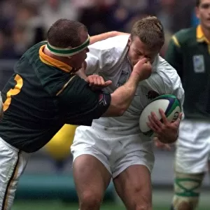 Englands Nick Beal gets a punch of South Africa