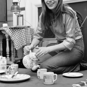 English actress and singer Jane Birkin pictured at home pouring tea. March 1971