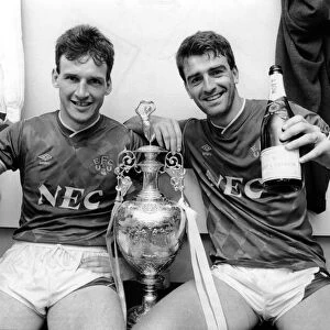 Everton captain Kevin Ratcliffe (right) and team mate Dave Watson celebrate with a glass