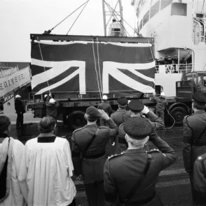 Fallen heroes from the Falklands come home. Sixty four bodies are brought back in Union