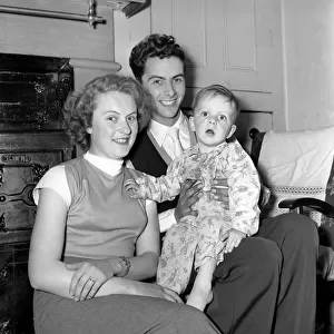 Family life: Mr. and Mrs. Hull with their son. 1954 A160-008