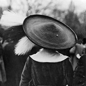 Fashion 1912: Easter Bonnets. Easter 1912. - A "coolieO straw with three giant