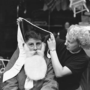 Father Christmas Geoffrey Hall aged 15 seen here at Bushlan Department Store at Stoke