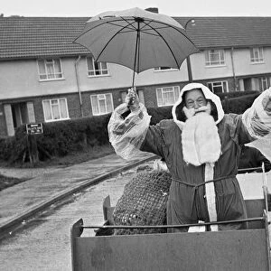 Father Christmas seen here touring the roads of Burghfield during his journey to Willink