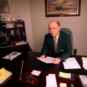 FERGUS MCCANN CELTIC FC CHAIRMAN FOOTBALL CLUB SITTING AT DESK