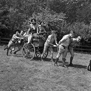 Film Cuckoo patrol May 1965 a scene from the film starring Freddie & the Dreamers pushing