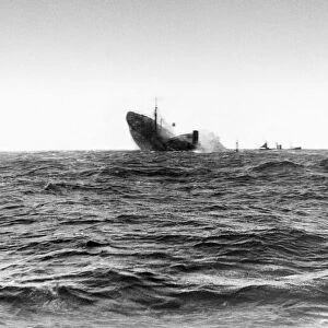 The final moments of an allied cargo ship after she had been torpedoed by a German U-Boat