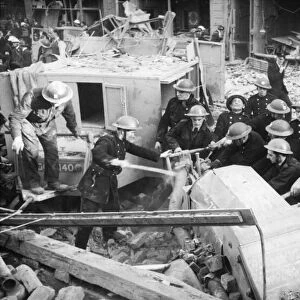 Fireman at a sub station in London, after it was hit in The Blitz of World War Two
