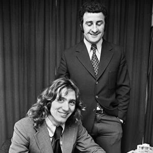 Footballer Robin Friday with Reading FC manager Charlie Hurley after signing a
