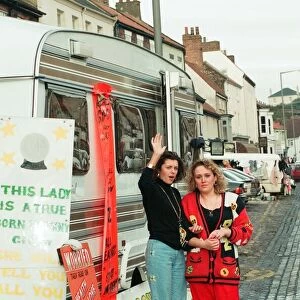 Fortune tellers outside their caravan during the annual Riding the Fair procession sets