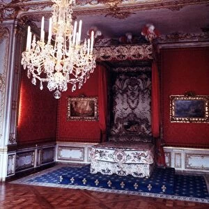France Paris The Queens bed chamber in the Palace of Versailles Crystal chandelier