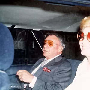 Frank Sinatra singer and wife sit in car