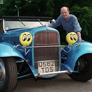 Fraser Walker with his blue 1932 Ford Model B Hot Rod