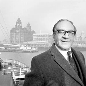 Fred Mulley, Minister of Transport, steered the ferry across the Mersey from Liverpool to