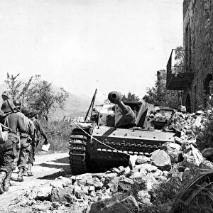 French troops break Gustav line. On the right is a knocked out German Mk. 3 tank