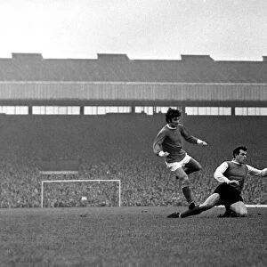 George Best scores a goal for Manchester United past Sheffield Wednesday defender Johnny