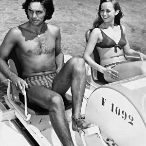 George Best sharing his champagne life style with actress Susan George in Palma Nova