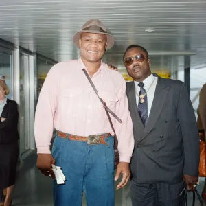 George Foreman and Joe Frazier at London Airport. 16th October 1989