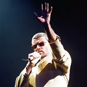George Michael performing on stage at the Wembley Arena during his Cover to Cover tour