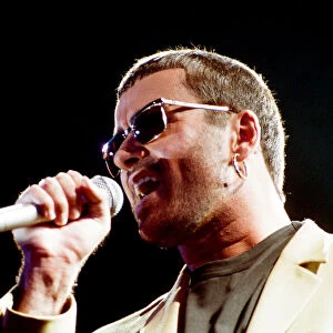 George Michael performing on stage at the Wembley Arena during his Cover to Cover tour