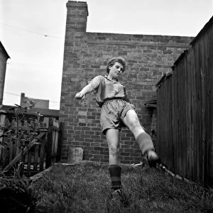 Girl soccer player Margaret Parkes. 1956 A509-001