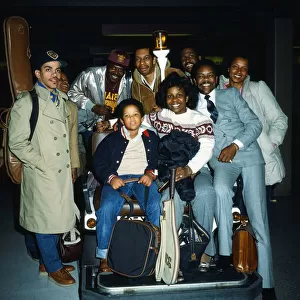 Gladys Knight with her son Shanga and some of her road crew at London Airport