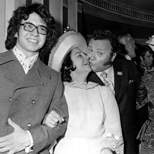 Former Goon Harry Secombe receives a kiss from his wife Myra at the Variety
