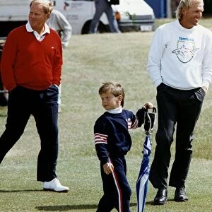 Greg Norman Australian golfer with son Gregory and Jack Nicklaus (L)