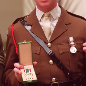 GULF WAR HERO JAMES HEWITT HOLDING HIS MEDAL AT THE SAUDI EMBASSY - 24 / 07 / 1992