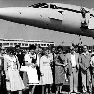Happy passengers about to board the British Airways Concorde airliner / aircraft at