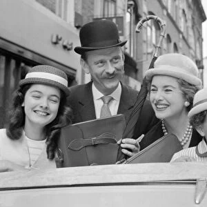 Hats by Milliner Victor Hyett seen here modelled in a London street prior to the 1959