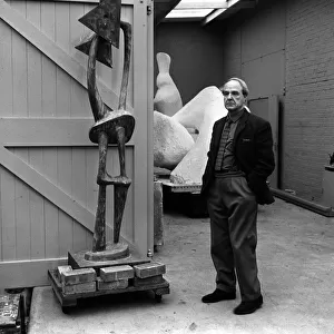 Henry Moore Artist and Sculpture May 1963 outside his studio with his work