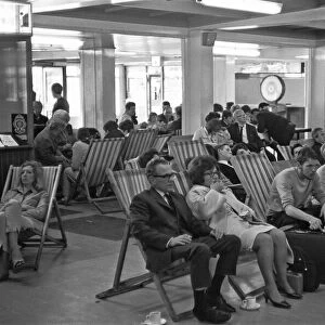 Holidaymakers waiting for their delayed flight to be called at Southend Airport 13th July