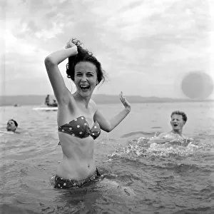 Holidays: Couples enjoying the beach on Corsica. August 1957 A503a-002