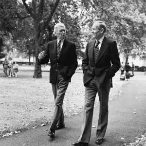 Hollywood stars Henry Fonda and James Stewart walk through Grosvenor Square in London