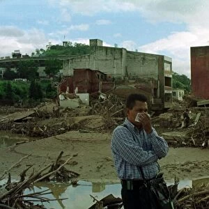 Honduras Weather Hurricane Mitch Nov 1998 Debris mounted up behind him