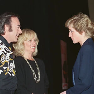 HRH The Princess of Wales, Princess Diana, greets American singer Neil Diamond