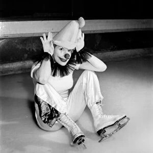 An Ice Skating female Clown performing. January 1953 D597-002